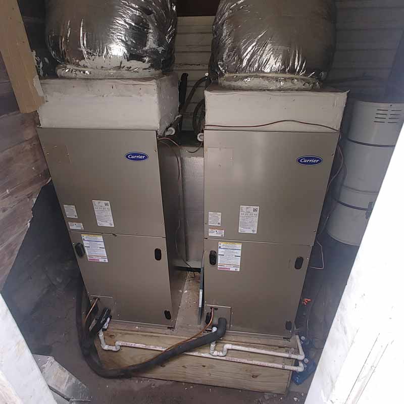 Two newly-installed Carrier water heaters